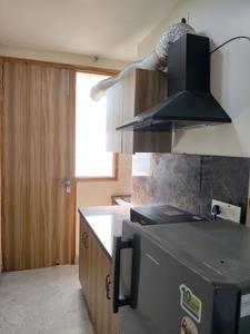Kitchen Image of 780 Sq.ft 1 BHK Builder Floor for rent in Sector 27 Gurgaon for Rs. 31000