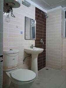 Common Bathroom Image of 1070 Sq.ft 2.5 BHK Apartment / Flat for sale in Amrapali Zodiac, Sector 120 Noida for Rs. 9300000