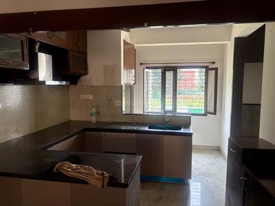 Kitchen Image of 1200 Sq.ft 2 BHK Apartment / Flat for rent in Domlur Layout Bengaluru for Rs. 50000