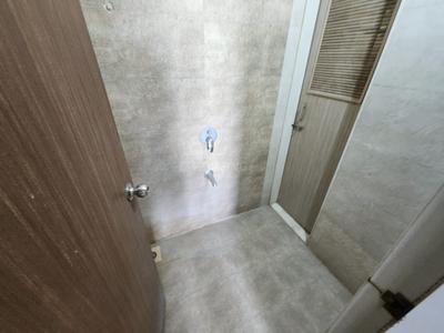 Bathroom Image of 701 Sq.ft 1 BHK Apartment / Flat for sale in Vishesh Balaji Symphony, Shilottar Raichur Navi Mumbai for Rs. 5500000
