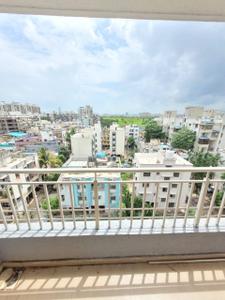 Balcony Image of 690 Sq.ft 1 BHK Apartment / Flat for rent in Surya Nagari society, Pimple Gurav Pune for Rs. 15000
