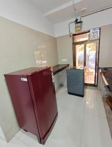 Kitchen Image of Navkar PG in Goregaon West, Mumbai