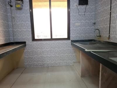 Kitchen Image of 950 Sq.ft 2 BHK Apartment / Flat for sale in Aaron Moreshwar Complex, Kamothe Navi Mumbai for Rs. 9500000