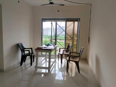Living Room Image of 650 Sq.ft 1 BHK Apartment / Flat for sale in Rajaram Shivam Enclave, Shilphata Thane for Rs. 3895000