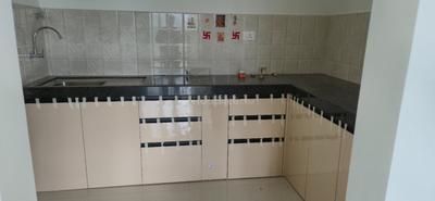 Kitchen Image of 1015 Sq.ft 2 BHK Apartment / Flat for rent in Shapoorji Pallonji Joyville Sensorium, Maan Pune for Rs. 25000
