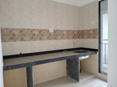 Kitchen Image of 680 Sq.ft 1 BHK Apartment / Flat for sale in Pushpak Nagar Navi Mumbai for Rs. 4300000