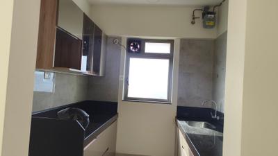 Kitchen Image of 764 Sq.ft 2 BHK Apartment / Flat for sale in Sheth Irene Wing A Phase 1, Malad West Mumbai for Rs. 23500000