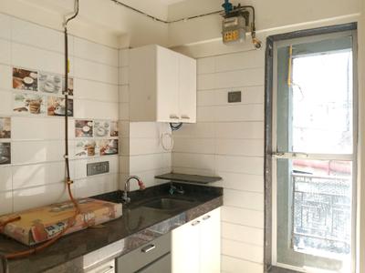 Kitchen Image of 500 Sq.ft 1 BHK Apartment / Flat for rent in Cosmos Jewels, Kasarvadavali Thane for Rs. 18500