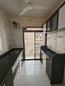 Kitchen Image of 670 Sq.ft 1 BHK Apartment / Flat for sale in Om Prabhu Manohar CHS, Seawoods Navi Mumbai for Rs. 11000000
