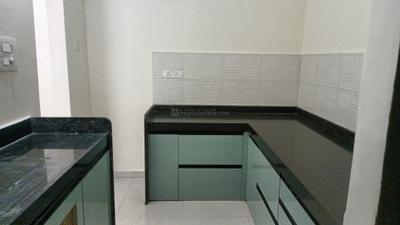 Kitchen Image of 1050 Sq.ft 2 BHK Apartment / Flat for sale in Mantra Montana, Dhanori Pune for Rs. 8000000