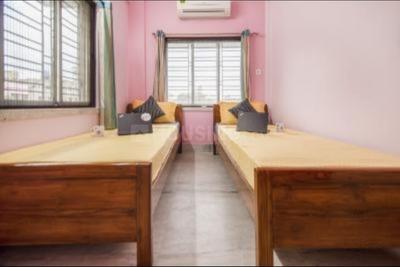 Bedroom Image of AIRPORT AC PG in Kaikhali, Kolkata