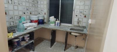 Kitchen Image of 1011 Sq.ft 2 BHK Apartment / Flat for rent in Betop Madhu Malancha, Airport Gate No 2 Kolkata for Rs. 15500