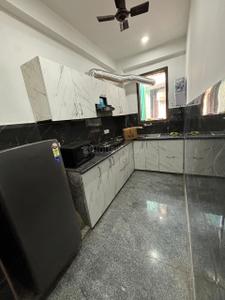 Kitchen Image of 1000 Sq.ft 2 BHK Builder Floor for rent in Sector 27 Gurgaon for Rs. 44000