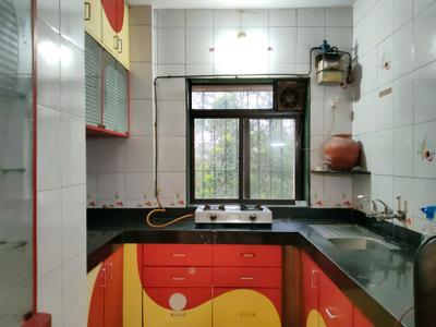 Kitchen Image of 710 Sq.ft 1.5 BHK Apartment / Flat for sale in Rosa Gardenia, Kasarvadavali Thane for Rs. 7500000