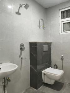 Common Bathroom Image of 1500 Sq.ft 3 BHK Apartment / Flat for sale in Vyom Residency, Noida Extension Greater Noida for Rs. 5500000
