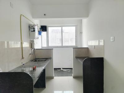 Kitchen Image of 1050 Sq.ft 2 BHK Apartment / Flat for sale in Siddh Amara Phase II, Bavdhan Pune for Rs. 8700000