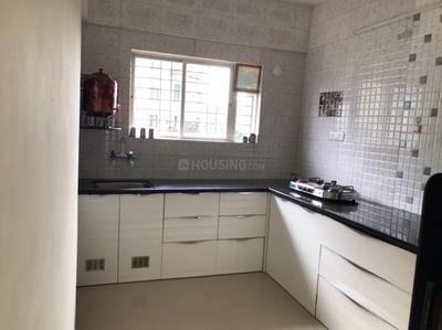 Kitchen Image of 850 Sq.ft 2 BHK Apartment / Flat for rent in KK Angels Building No 1, Rahatani Pune for Rs. 30000