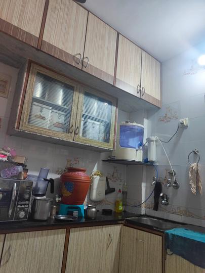 Kitchen Image of 915 Sq.ft 2 BHK Apartment / Flat for sale in RNA Courtyard, Mira Road East Mumbai for Rs. 13000000