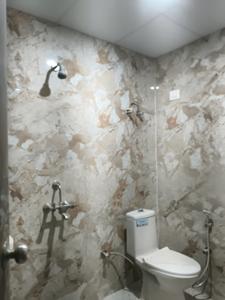 Common Bathroom Image of 1050 Sq.ft 2 BHK Apartment / Flat for sale in Aambesten Twin Celestial, Noida Extension Greater Noida for Rs. 4150000