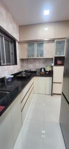 Kitchen Image of 850 Sq.ft 2 BHK Apartment / Flat for sale in Axis Whistling Meadows, Bhugaon Pune for Rs. 10500000