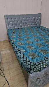 Bedroom Image of Kuljeet pg in Janakpuri, New Delhi