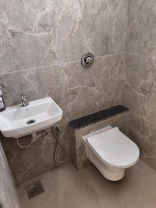 Common Bathroom Image of 1000 Sq.ft 2 BHK Apartment / Flat for sale in Sarjan Setu Altezza, Tragad Ahmedabad for Rs. 6500000