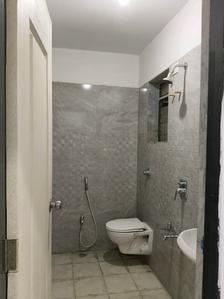 Common Bathroom Image of 616 Sq.ft 1 BHK Apartment / Flat for sale in Cosmos Meluha, Khidkali Thane for Rs. 4700000