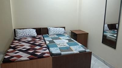 Bedroom Image of RV PG in Sector 18, Noida